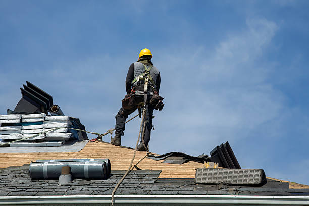 Professional Roofing technician working in North Marshfield, MA